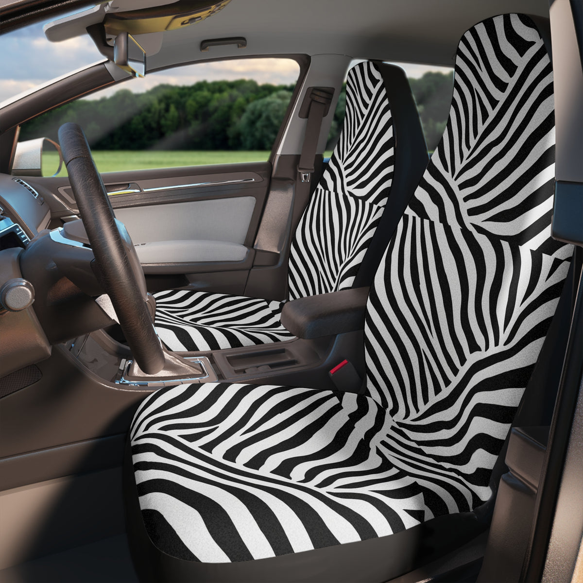 Patchwork zebra print car seat covers, fitted on the front seats of a car