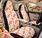 Peach fruit print car seat covers shown in a car interior