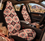 Pink aztec diamond car seat covers shown in a car interior