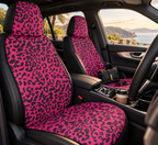 Pink black leopard print car seat covers shown in a car interior