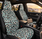 Pink blue leopard print car seat covers shown in a car interior