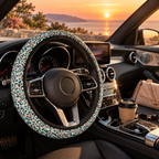Pink blue leopard print steering wheel cover shown in a car interior