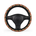 Pink camo steering wheel cover, on a steering wheel