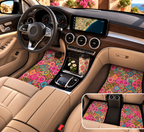 Pink floral car mats shown in a car interior