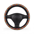 Pink floral steering wheel cover, on a steering wheel