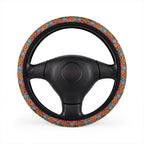 Pink floral steering wheel cover, on a steering wheel