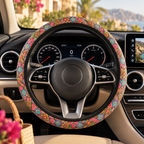 Pink floral steering wheel cover shown in a car interior