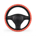 Pink gingham steering wheel cover, on a steering wheel