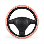 Pink peach print steering wheel cover, on a steering wheel