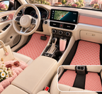 Pink polka dot car mats shown in a car interior