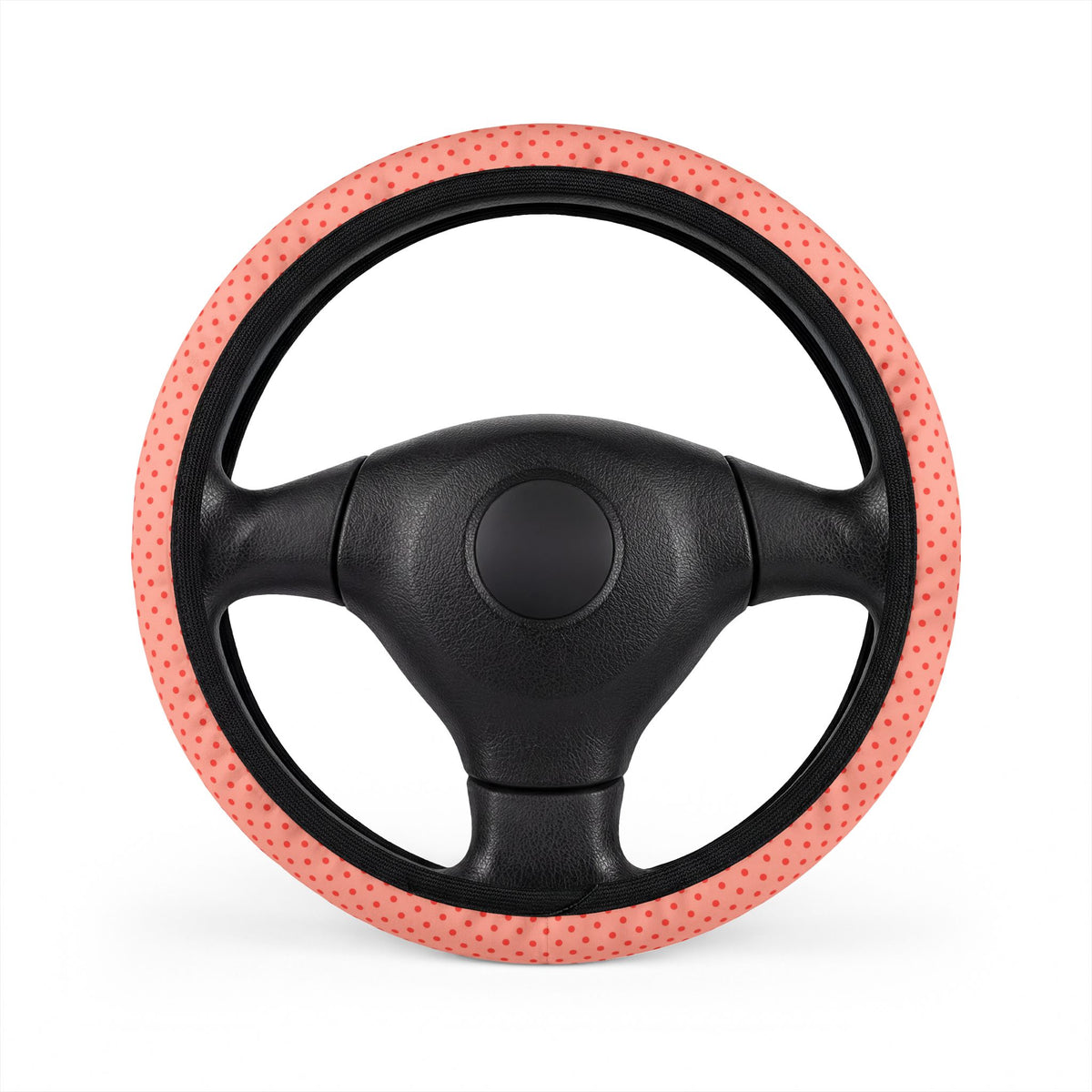 Pink polka dot steering wheel cover, on a steering wheel