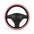 Pink unicorn steering wheel cover, on a steering wheel