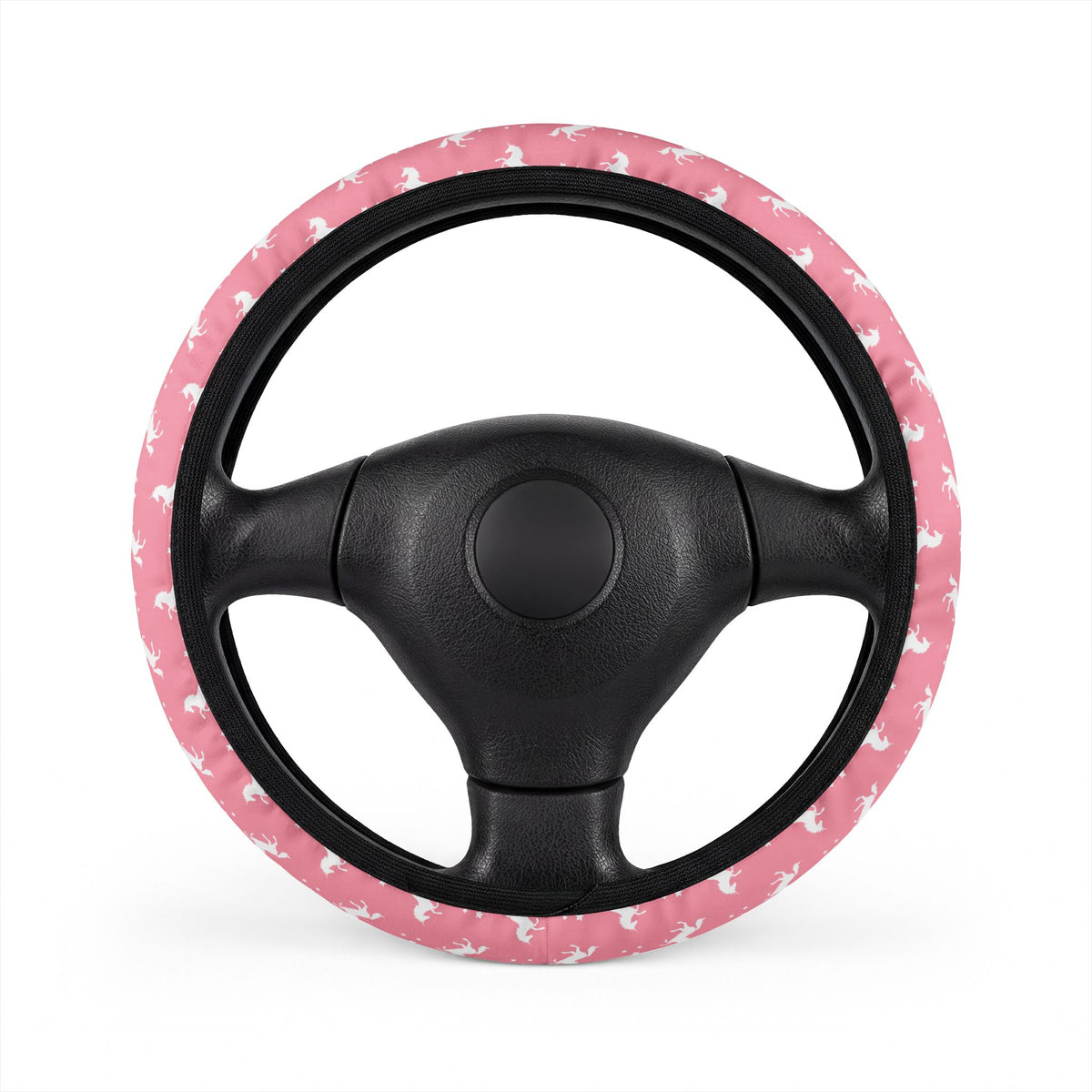 Pink unicorn steering wheel cover, on a steering wheel