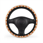 Retro orange flower print steering wheel cover, on a steering wheel