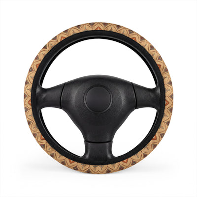 Tan desert boho steering wheel cover, on a steering wheel
