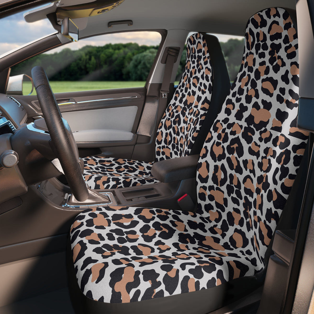 White brown leopard print car seat covers, fitted on the front seats of a car