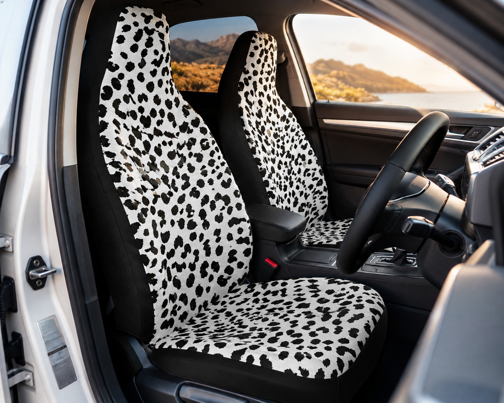 White leopard print car seat covers shown in a car interior