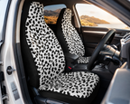White leopard print car seat covers shown in a car interior