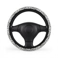 White leopard print steering wheel cover, front view