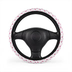 White pink unicorn steering wheel cover, on a steering wheel