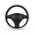 White polka dot steering wheel cover, on a steering wheel
