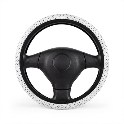 White polka dot steering wheel cover, on a steering wheel